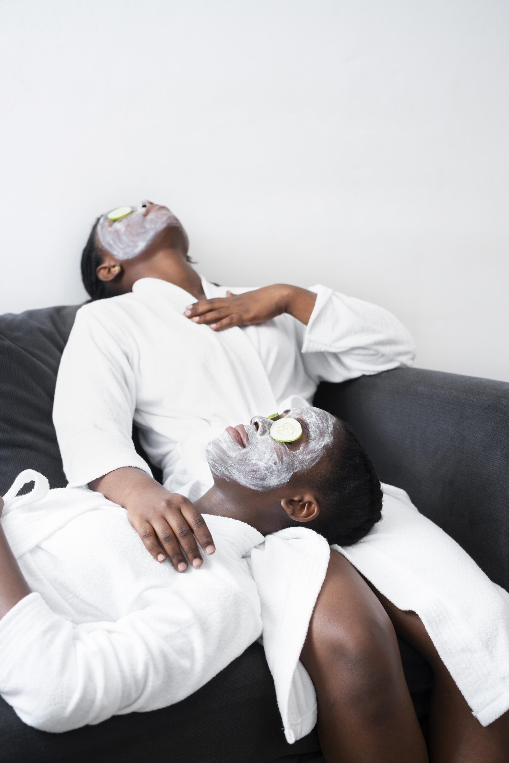 beautiful women doing facial treatment home