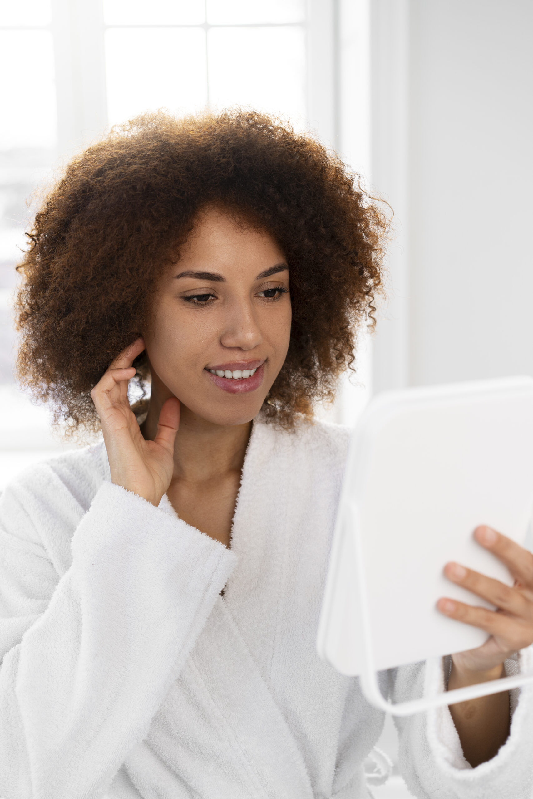 woman wearing bathrobe medium shot